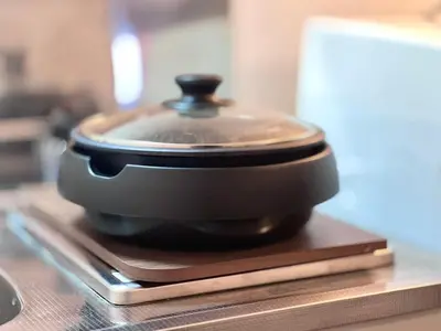 a black pot sitting on top of a stove at JUN shinjuku408-SJ0099 in Tokyo