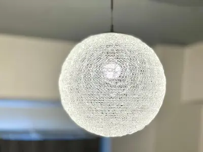 a white light fixture hanging from a ceiling at JUN shinjuku408-SJ0099 in Tokyo