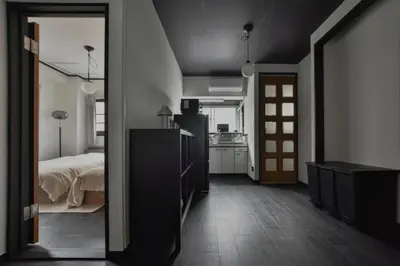 a room with a bed and a kitchen and a mirror at Okada Building - Vacation STAY 16358 in Tokyo