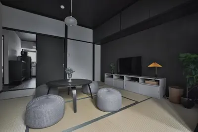 a living room with a table and a tv at Okada Building - Vacation STAY 16358 in Tokyo