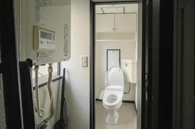 a bathroom with a white toilet in a room at Okada Building - Vacation STAY 16358 in Tokyo