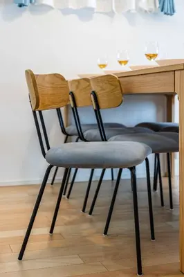 a wooden table with two chairs at a table at Modern House Tokyo east in Tokyo