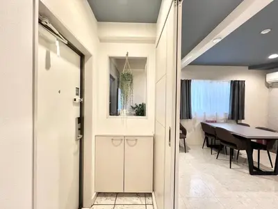 a door leading into a dining room with a table at Ichigayayanagichō 牛込柳町一户建-SJ0186 in Tokyo