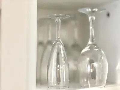 two empty wine glasses sitting on a shelf at Ichigayayanagichō 牛込柳町一户建-SJ0186 in Tokyo
