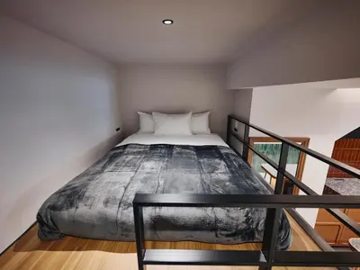 a bedroom with a bed in a room at illi Enu Yotsuya in Tokyo
