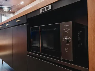 a microwave oven sitting on top of a counter at illi Enu Yotsuya in Tokyo