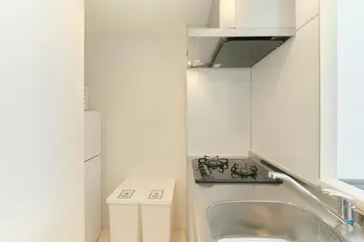 a small bathroom with a sink and a toilet at Hotel Dieu Nakanobu by Tranova in Tokyo