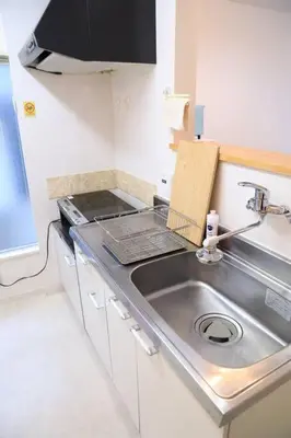 a kitchen with a sink and a counter top at 8路線使用可能！アクセス抜群/池袋駅より徒歩5分/最大11名/Wi-Fi完備/まるごと3LDK in Tokyo