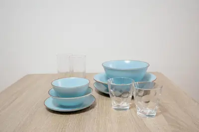a group of bowls and glasses sitting on a table at Liberty Corp 101 - Vacation STAY 16233 in Tokyo