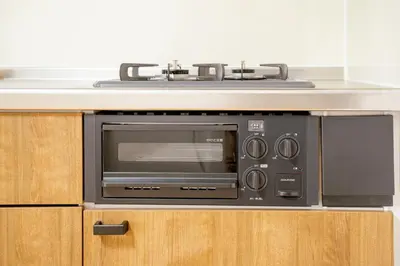 a microwave oven sitting on top of a counter at Liberty Corp 101 - Vacation STAY 16233 in Tokyo