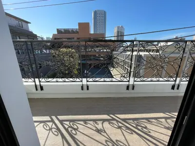 a balcony with a view of the city at COMMA HOUSE Shinjuku 402 in Tokyo