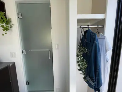 two pictures of a closet with a glass door at COMMA HOUSE Shinjuku 402 in Tokyo