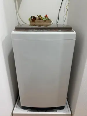 a white refrigerator with a plant on top of it at nestay miriz tokyo ikebukuro in Tokyo