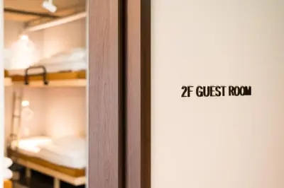 a door with a sign that reads at guest room at MANGA ART HOTEL, BAKUROCHO in Tokyo