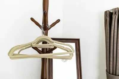 a light fixture hanging in front of a mirror at 18, Oji B, Detached house for rent, \u738b\u5b50B in Tokyo