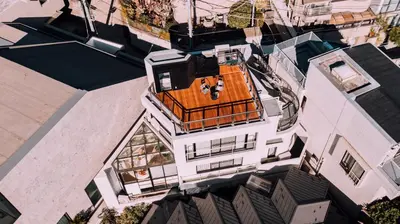 an overhead view of a building with a rooftop at One Shibuya Hill: Urban Oasis in Tokyo