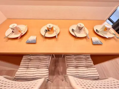 a table with plates of food on top of it at High-end Tokyo shinjuku Central Park Flat 5 in Tokyo