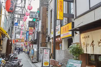 a city street with many signs and buildings at Liberty house208 /Shibuya 5min by train Sangenjaya in Tokyo