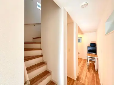 a hallway with stairs in a house at Kenki Ueno House-TT0170 in Tokyo