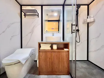 a bathroom with a toilet and a sink and a shower at LANG HOTEL Ueno # free Breakfast in Tokyo