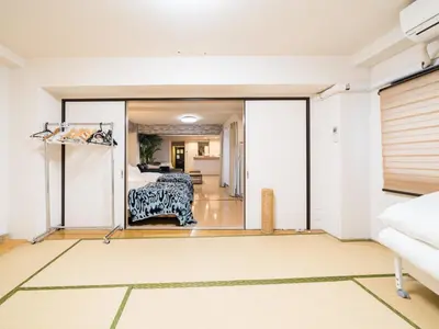 a room with a view of a bedroom at Shinjuku, 1min walk from Kagurazaka Sta,80sqm,Family-Friendly, in Tokyo