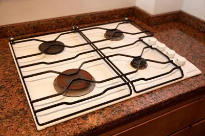 a stove top oven sitting on top of a counter at The Archaic / Luxury apartment near Shinjuku in Tokyo