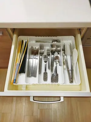 a drawer filled with utensils in a cabinet at 15min to Haneda Airport - Homies House Kamata for up to 9 guests in Tokyo