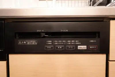 a microwave oven sitting on top of a table at FINOA Residential Suite Horikiri in Tokyo