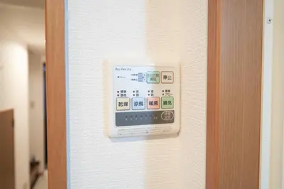 a switch on a wall with an ipod on it at FINOA Residential Suite Horikiri in Tokyo
