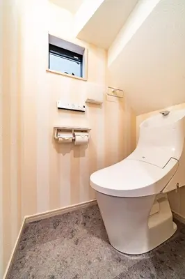 a bathroom with a toilet and a window at 56, Horikiri-Syobuen, Detached House for Rent, \u5800\u5207\u83d6\u84b2\u5712 in Tokyo