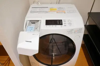 a white washer and dryer in a room at Yadoya Hototogisu - Vacation STAY 37432v in Tokyo