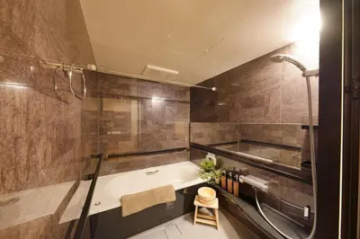 a bathroom with a tub and a shower at Yadoya Hototogisu - Vacation STAY 37442v in Tokyo