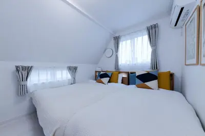 a bedroom with a white bed and a window at HOTEL Dining Plus - Vacation STAY 39103v in Tokyo