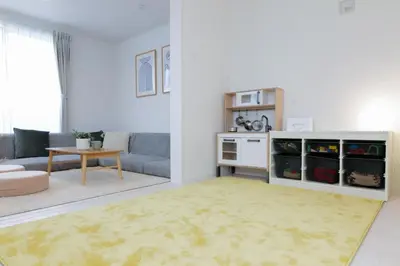 a living room with a couch and a table at HOTEL Dining Plus - Vacation STAY 39103v in Tokyo