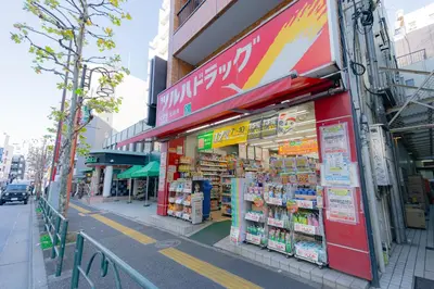 a store on the side of a street at unito residence WASEDA in Tokyo