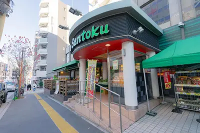a sandwich shop on a city street at unito residence WASEDA in Tokyo