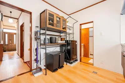 a living room with a kitchen and a room with a kitchen at Himawari in Tokyo