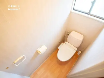 a bathroom with a toilet and two rolls of toilet paper at 7\u6642IN19\u6642OUT # \u6c60\u888b\u738b\u5b50\u8d64\u7fbd\u99c5\u7121\u6599\u9001\u8fce # \u4e0a\u91ce\u99c514\u5206 # \u4e00\u68df\u8cb8\u3057 # 2LDK2LDK # \u6700\u592724\u4eba # 7 00 IN19 00 OUT # Free pick-up at Ikebukuro, Oji, and Akabane Stations # 14 min to Ueno # Whole house rental # 2LDK2LDK # Max 24 in Tokyo