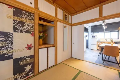 a room with a table and a dining room at Eden House Skytree & Skygarden in Tokyo