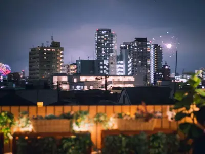 a city skyline at night with tall buildings at Eden House Skytree & Skygarden in Tokyo