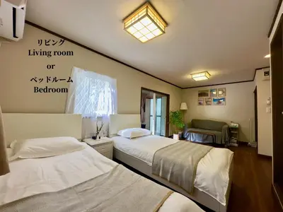 a hospital room with two beds and a window at 7\u6642IN19\u6642OUT # \u897f\u6b66\u65b0\u5bbf\u99c5\u96fb\u8eca11\u5206 # \u30c6\u30e9\u30b9 # \u30d9\u30c3\u30c8\u53ef # \u65b0\u898f # \u6700\u59274\u540d # \u5c02\u7528\u30d0\u30b9\u30ad\u30c3\u30c1\u30f3 # 7 00 IN19 00 OUT # 11 min train to Seibu Shinjuku # Terrace # Bed available # Newly renovated # Max 4 guests # Private bath kitchen in Tokyo
