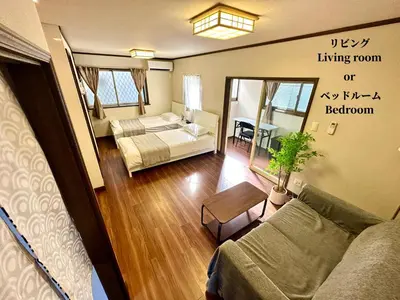 a bedroom with a bed and a living room at 7\u6642IN19\u6642OUT # \u897f\u6b66\u65b0\u5bbf\u99c5\u96fb\u8eca11\u5206 # \u30c6\u30e9\u30b9 # \u30d9\u30c3\u30c8\u53ef # \u65b0\u898f # \u6700\u59274\u540d # \u5c02\u7528\u30d0\u30b9\u30ad\u30c3\u30c1\u30f3 # 7 00 IN19 00 OUT # 11 min train to Seibu Shinjuku # Terrace # Bed available # Newly renovated # Max 4 guests # Private bath kitchen in Tokyo
