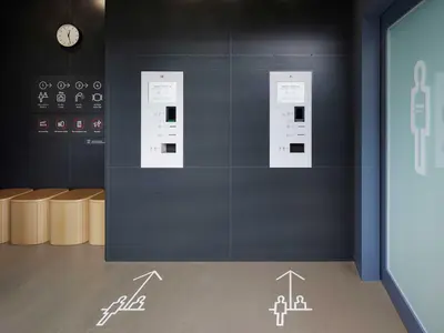 a room with a wall with a clock on it at 9h nine hours Shinagawa station for men in Tokyo
