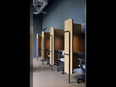 a row of cubicle stalls in a room at 9h nine hours Shinagawa station for men in Tokyo