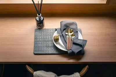 a table with a plate with a napkin and fork and knife at YOYOGI PARK HOTEL in Tokyo