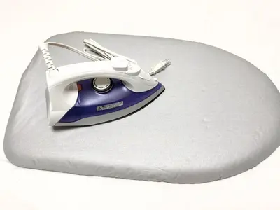 a iron sitting on top of a piece of paper at FARE Akihabara - Stylish Studio 8min from Station 102 in Tokyo