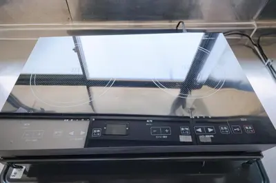 a laptop computer sitting on top of a shelf at Push house \u6d66\u5b89 in Tokyo