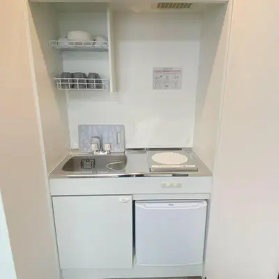 a small kitchen with a sink and a counter at 54, Tateishi, Entire house for rent, \u7acb\u77f3 in Tokyo