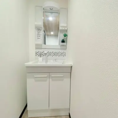 a white bathroom with a sink and a mirror at 54, Tateishi, Entire house for rent, \u7acb\u77f3 in Tokyo
