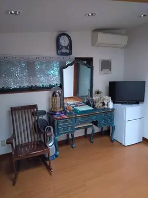 a room with a desk and a chair and a mirror at Stage YOU in Tokyo